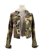 Camouflage jacket on a mannequin with a white background