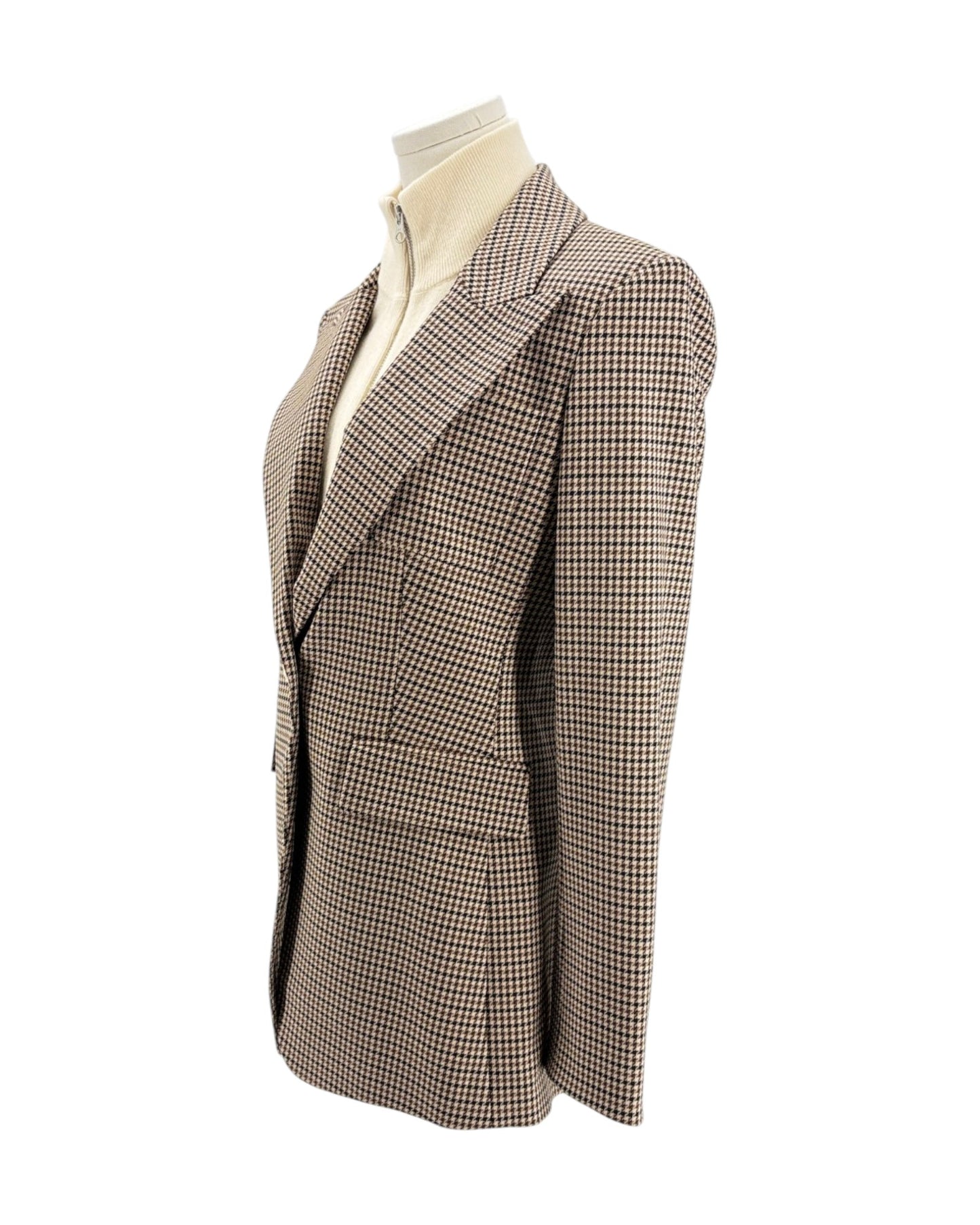 Houndstooth patterned blazer on a mannequin against a white background