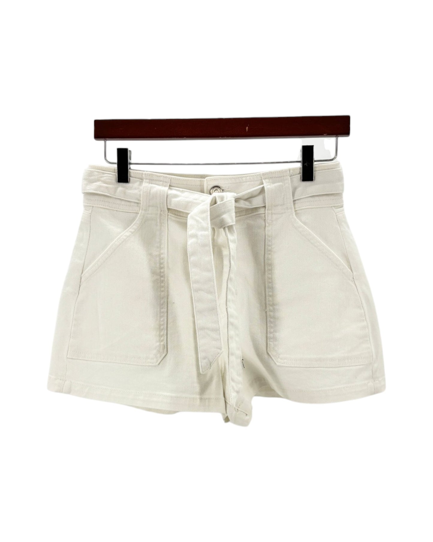 white shorts on a hanger against a white background