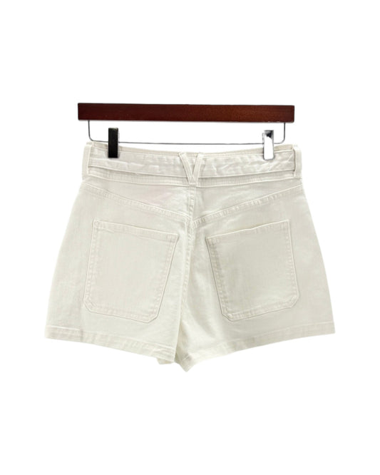 White shorts on a hanger against a white background