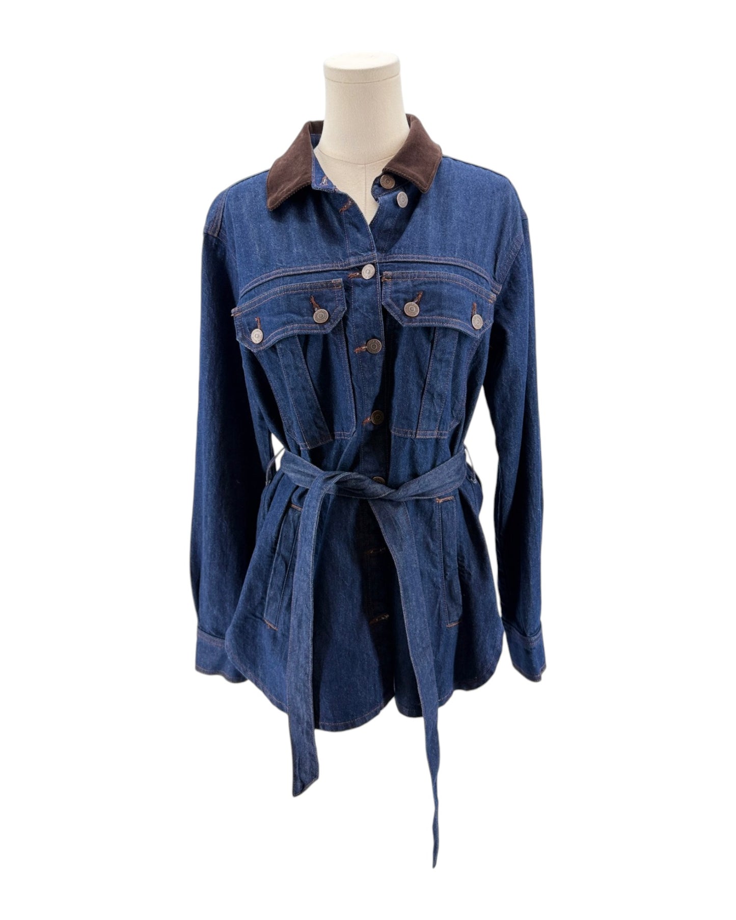 Blue denim jacket with a belt on a mannequin against a white background