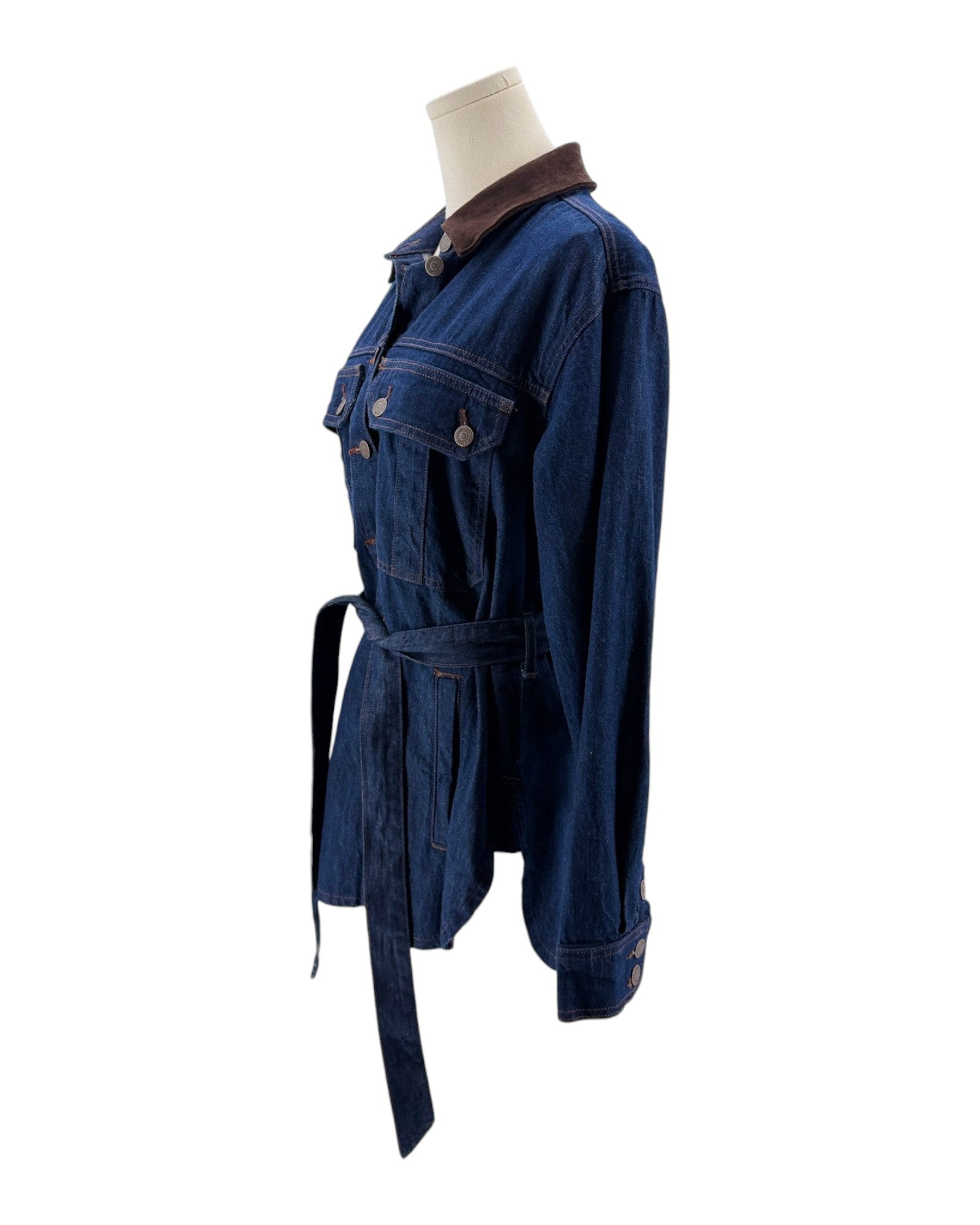 Blue denim jacket on a mannequin against a white background