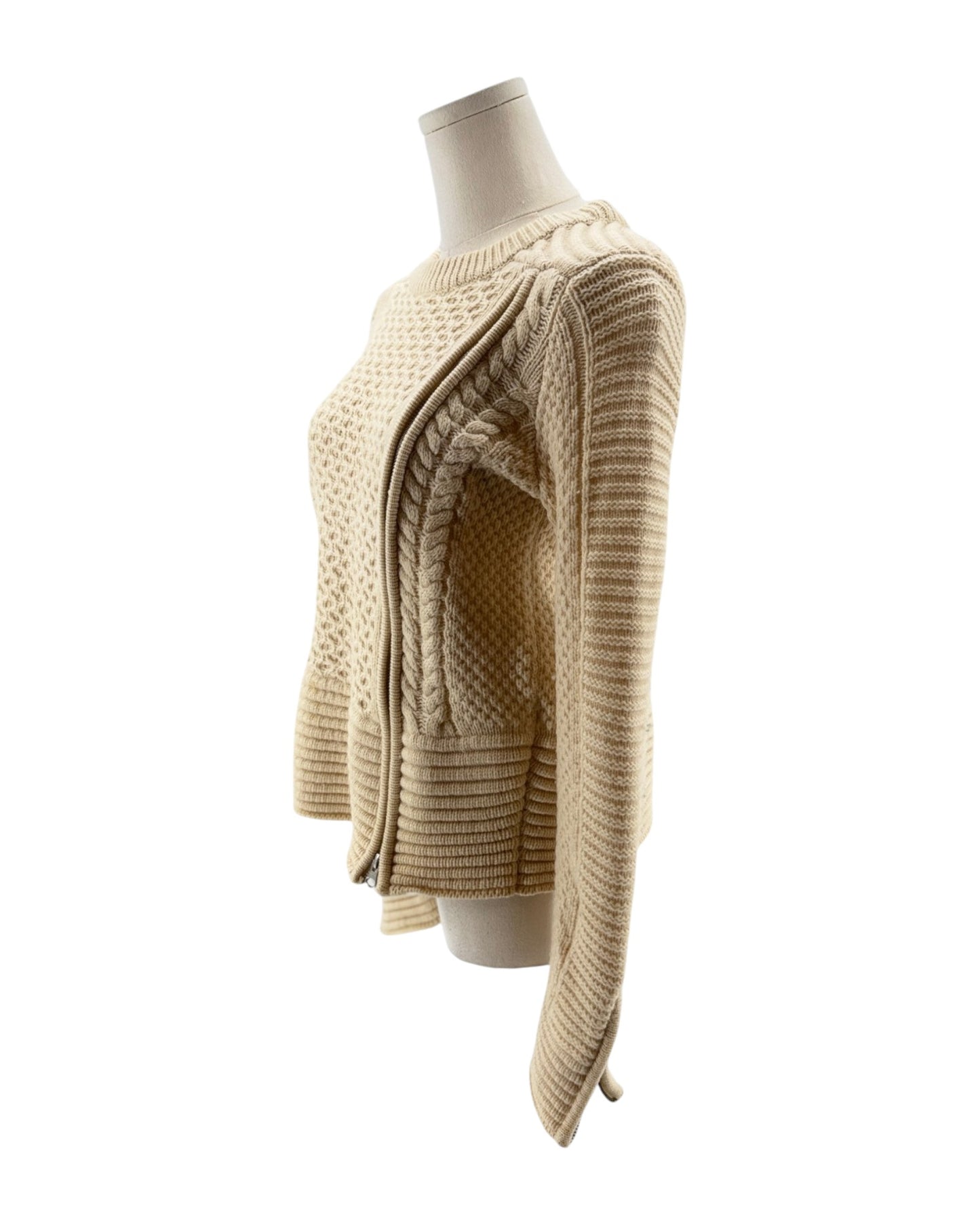 Beige knitted cardigan on a mannequin against a white background
