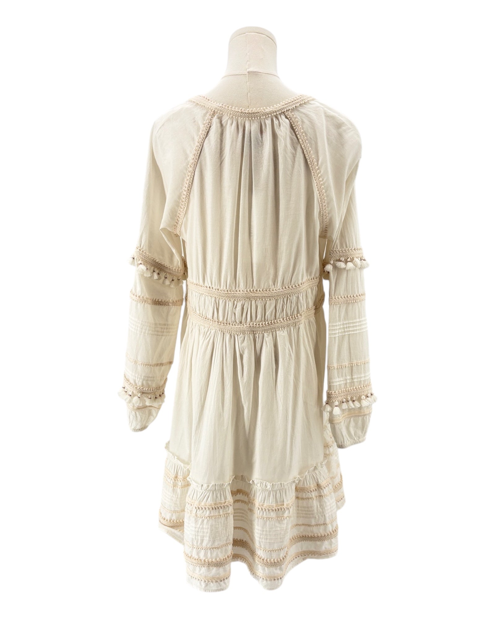 Veronica Beard cream dress on a mannequin against a white background