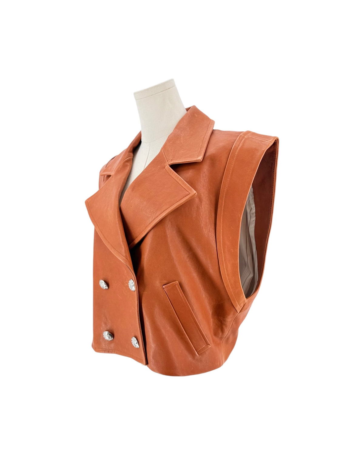 Burnt orange Lamb Leather Vest Pointed Collar Slit Pockets and button front on a white background on a mannequin