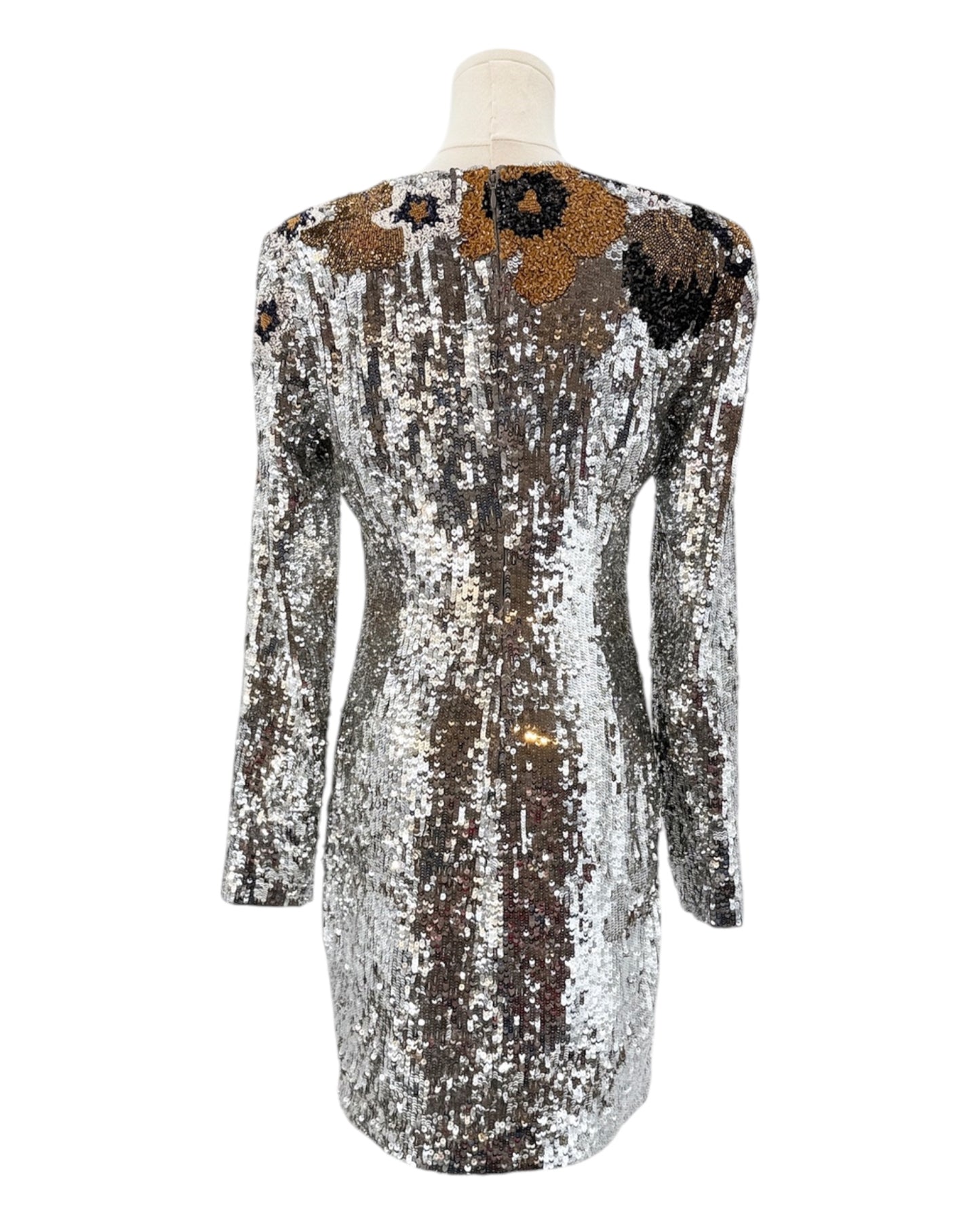 Silver sequin dress with black and brown floral patterns on a mannequin against a white background