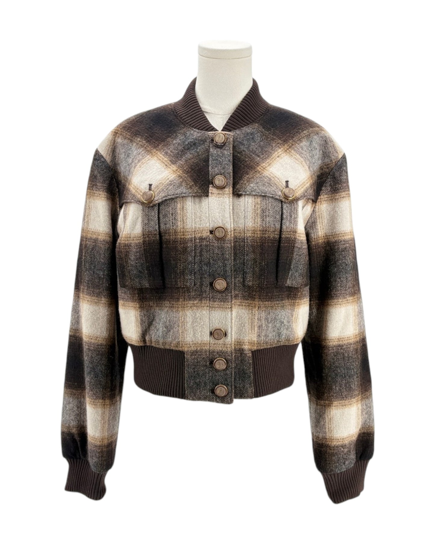 Plaid jacket on a mannequin against a white background