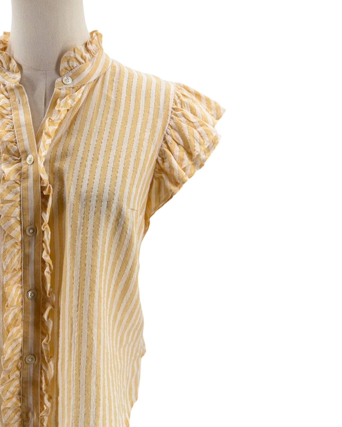 Yellow and white striped blouse on a mannequin with a plain background