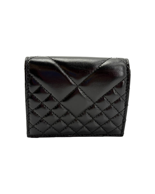 Black quilted wallet on a white background