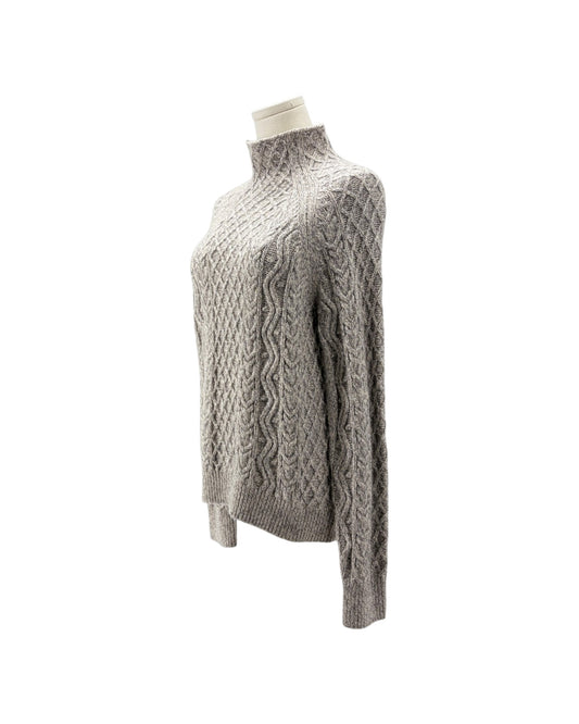 A light gray cable-knit mock neck sweater displayed on a cream mannequin torso against a plain white background.