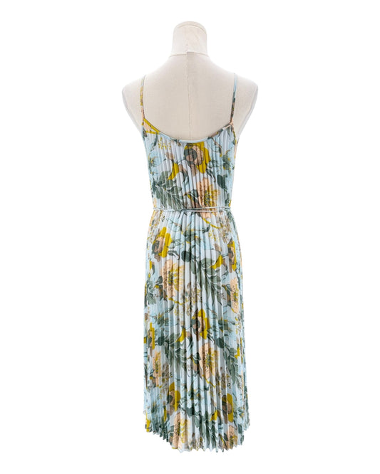 Floral dress on a mannequin against a white background