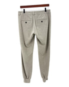 Gray wool jogger pants on a white background