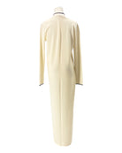 Mannequin wearing a cream-colored cardigan on a white background