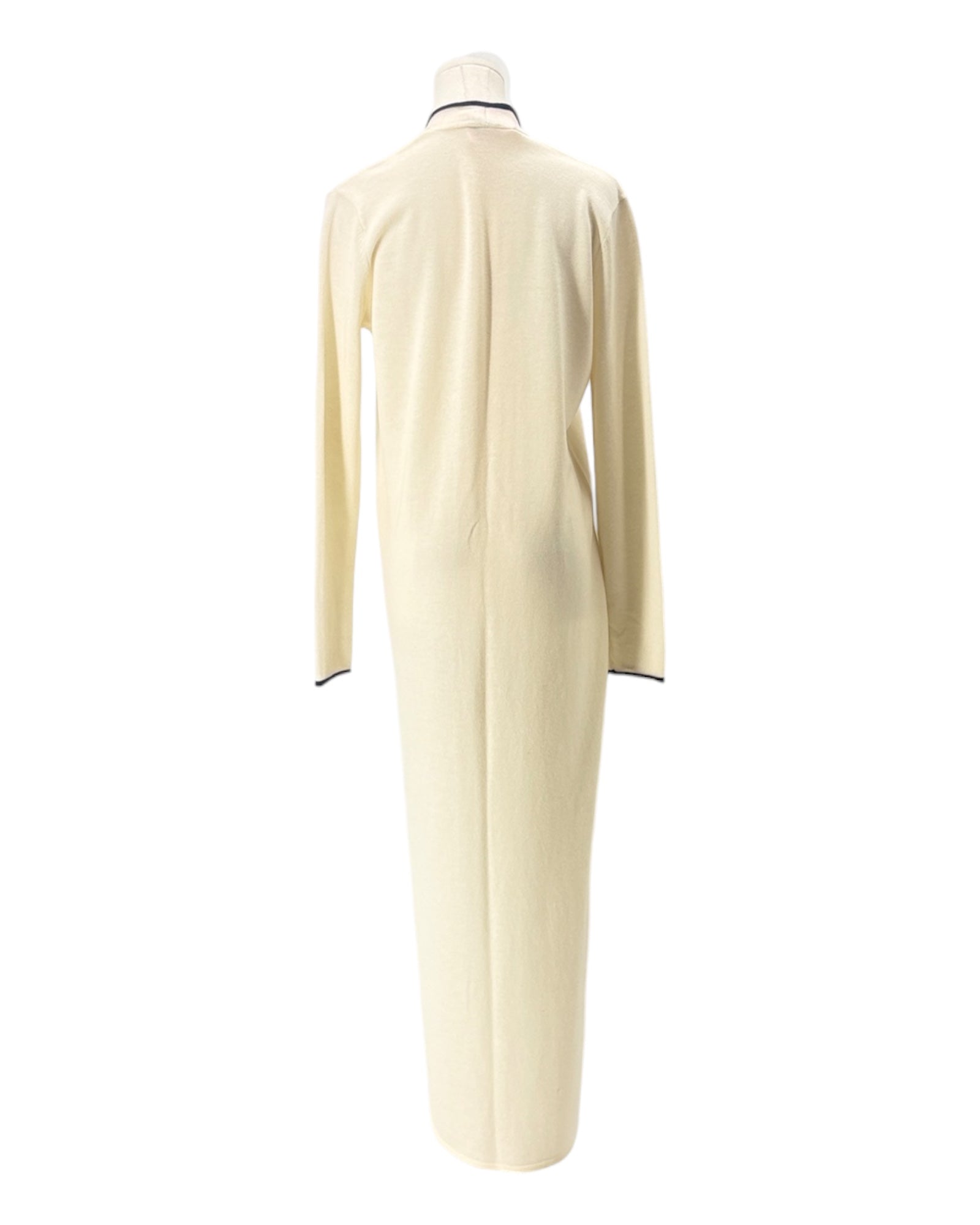 Mannequin wearing a cream-colored cardigan on a white background