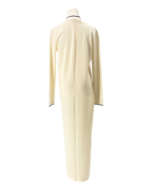 Mannequin wearing a cream-colored cardigan on a white background