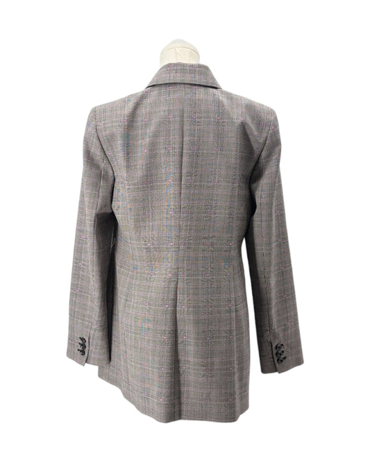 Gray checkered coat on a mannequin against a white background