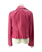 Pink jacket on a mannequin against a white background