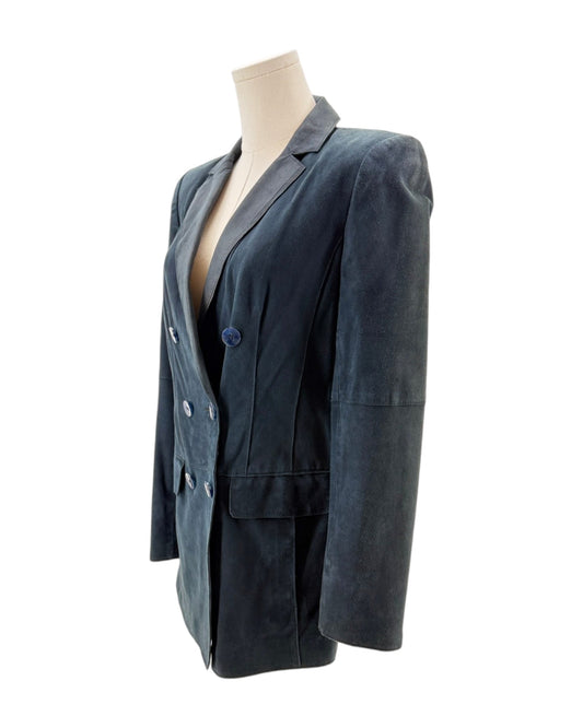Blue blazer on a mannequin against a white background