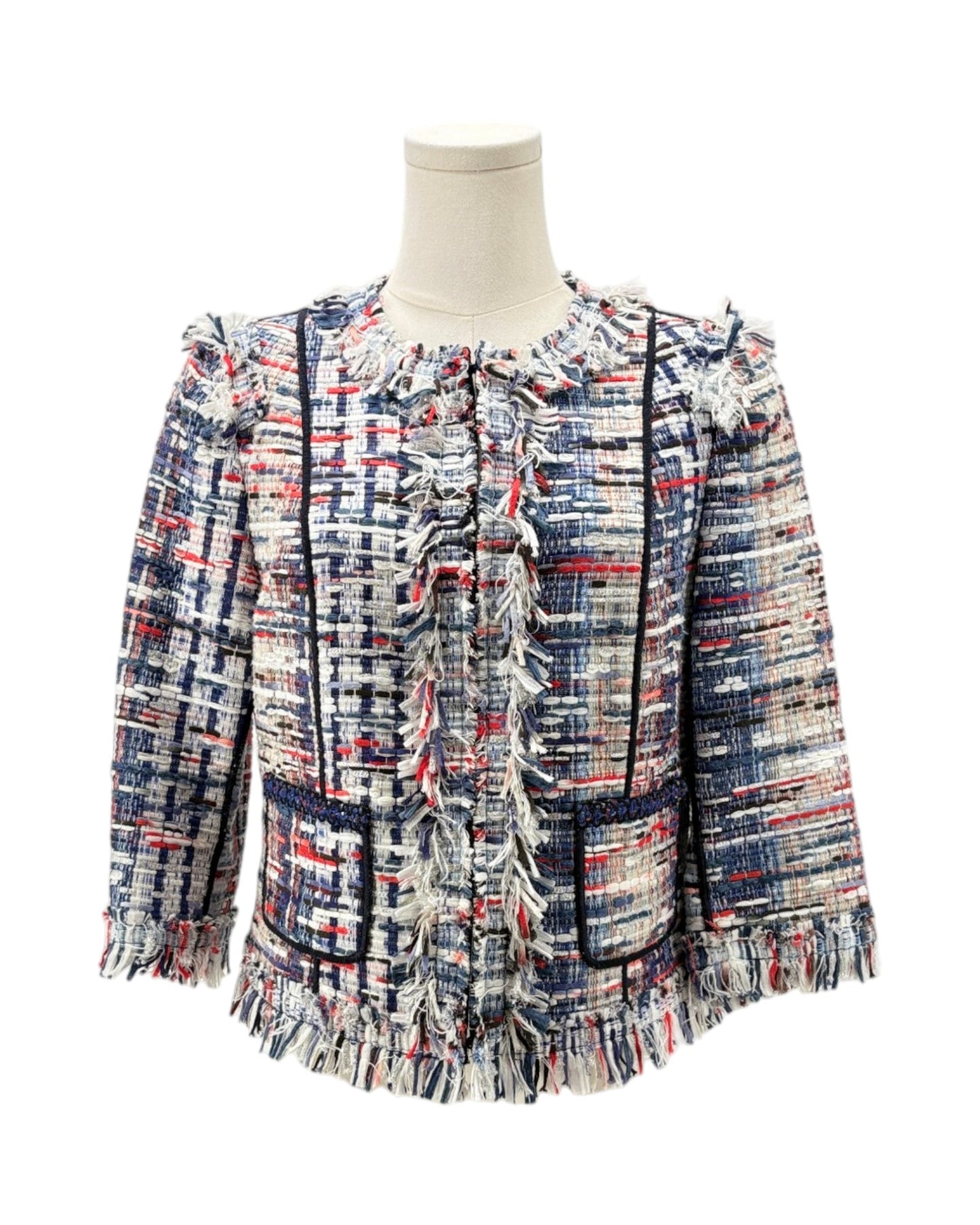 Multicolored textured jacket on a mannequin against a white background