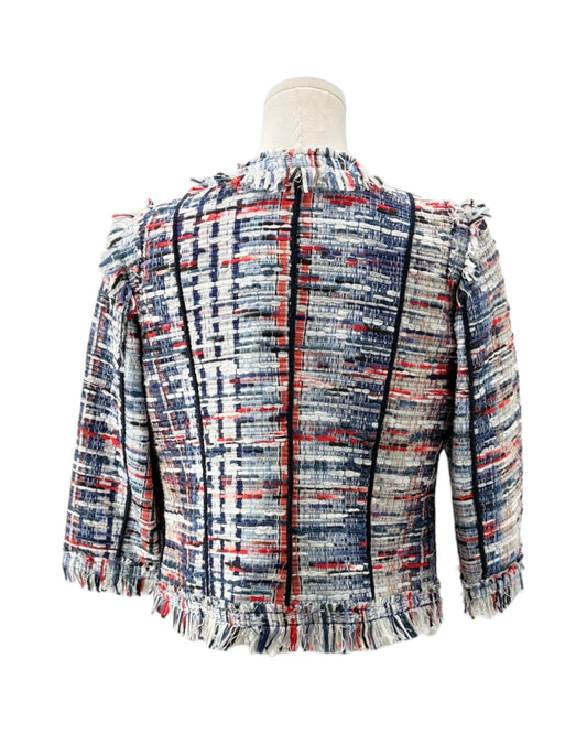 Multicolored plaid jacket on a mannequin against a white background