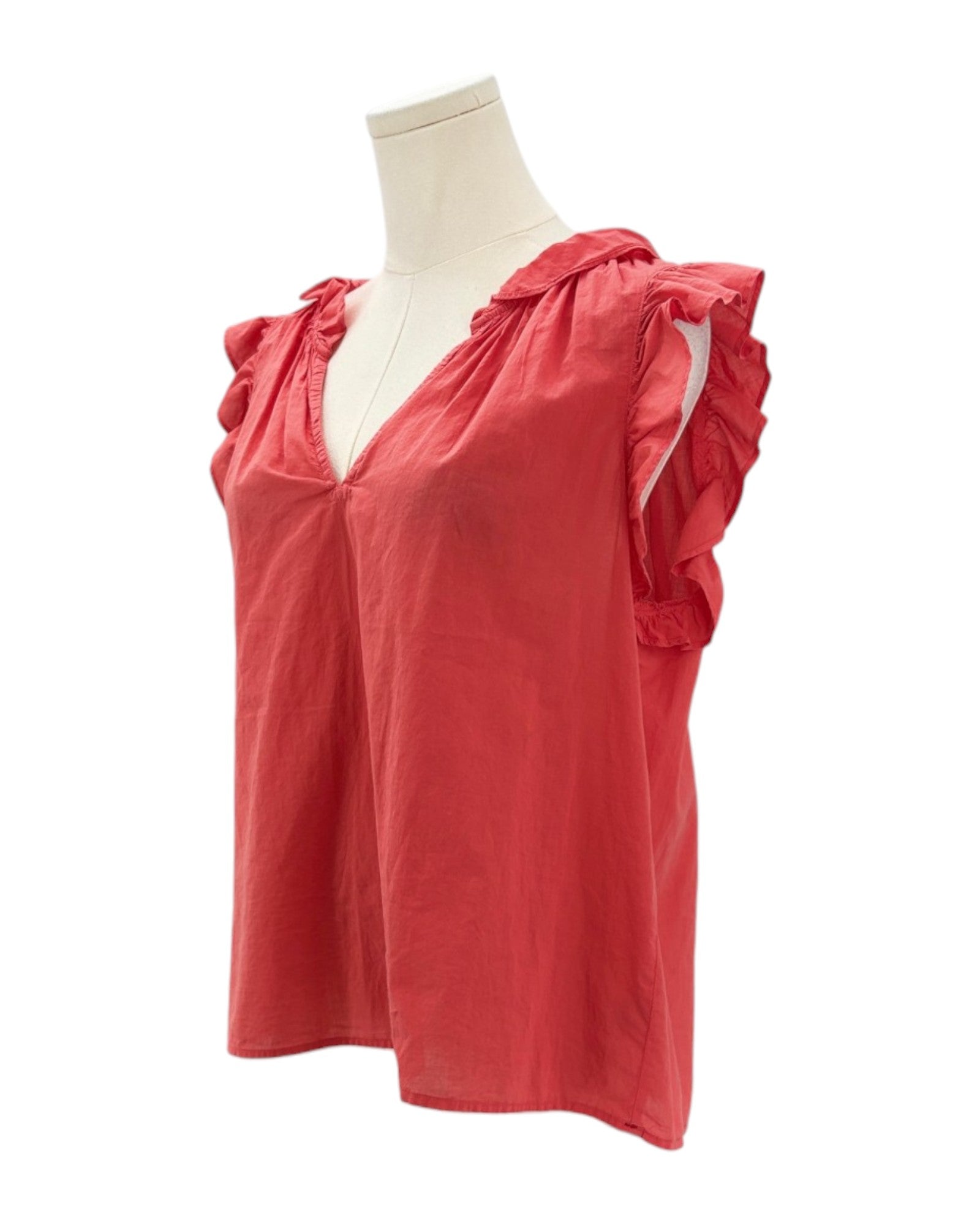 Red sleeveless top on a mannequin against a white background