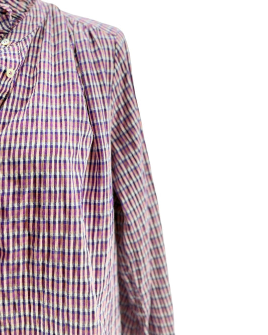 Close-up of a checkered shirt with a white background