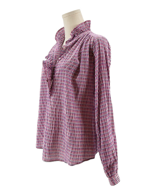 Pink and white checkered blouse on a mannequin against a white background