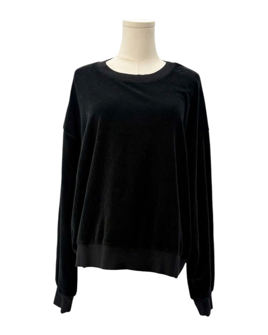 Black sweatshirt on a mannequin against a white background