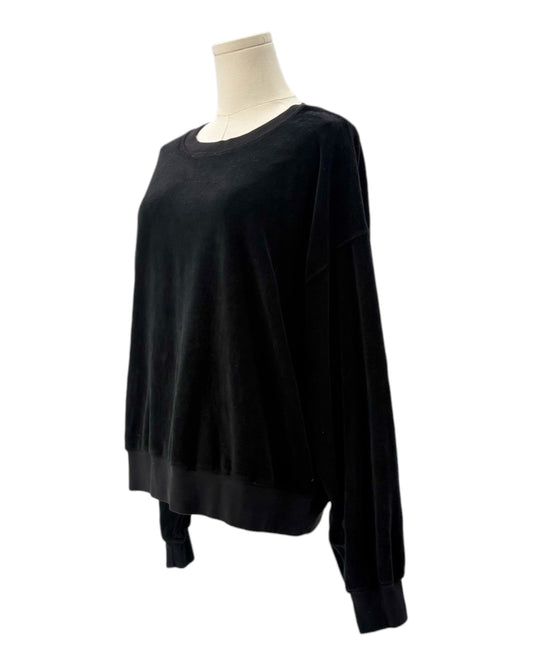 Black sweatshirt on a mannequin against a white background