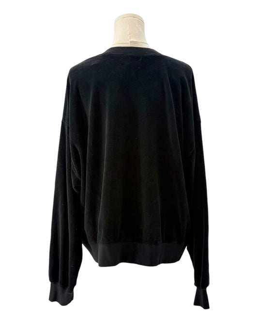 Black sweatshirt on a mannequin against a white background