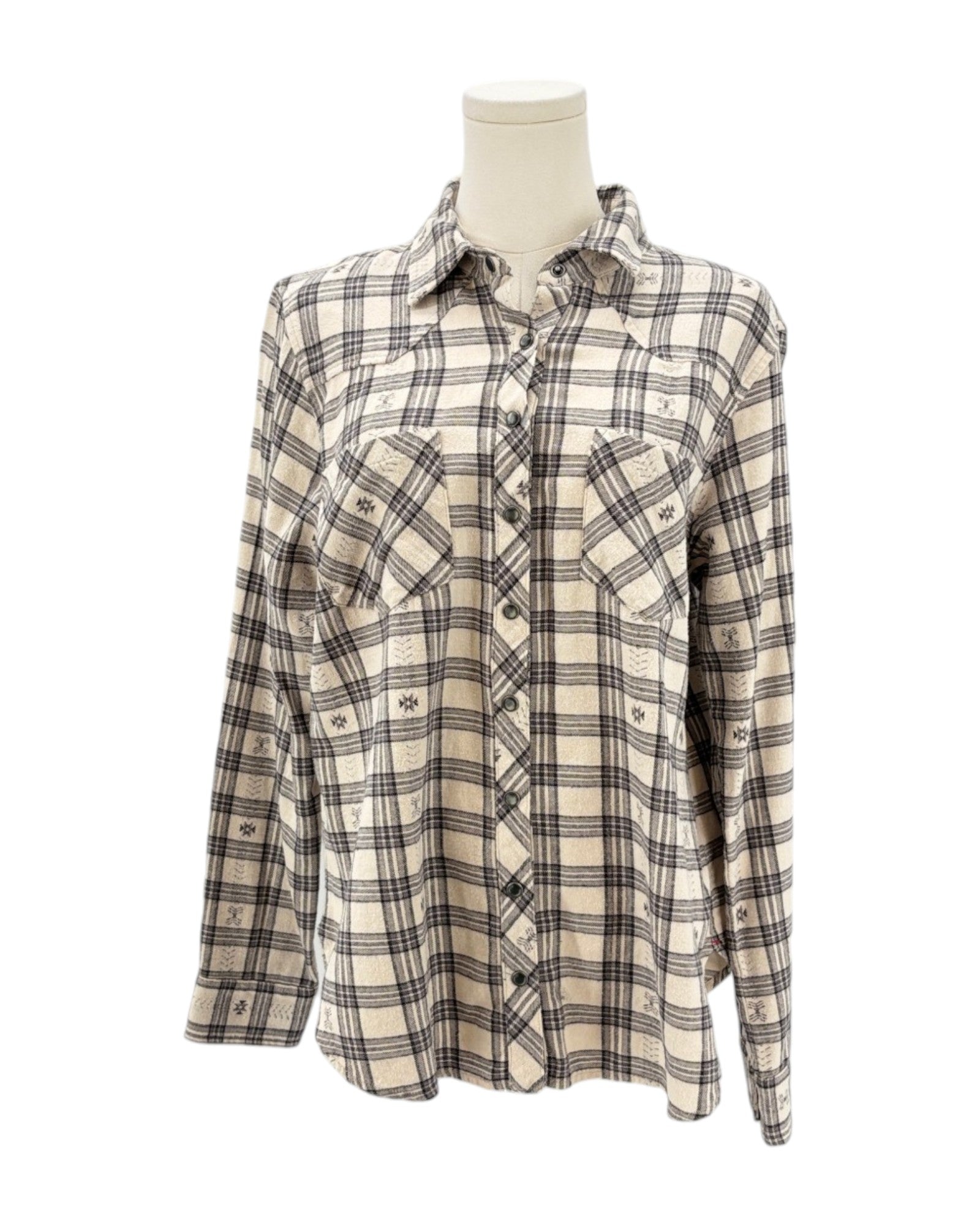 Plaid shirt on a mannequin against a white background