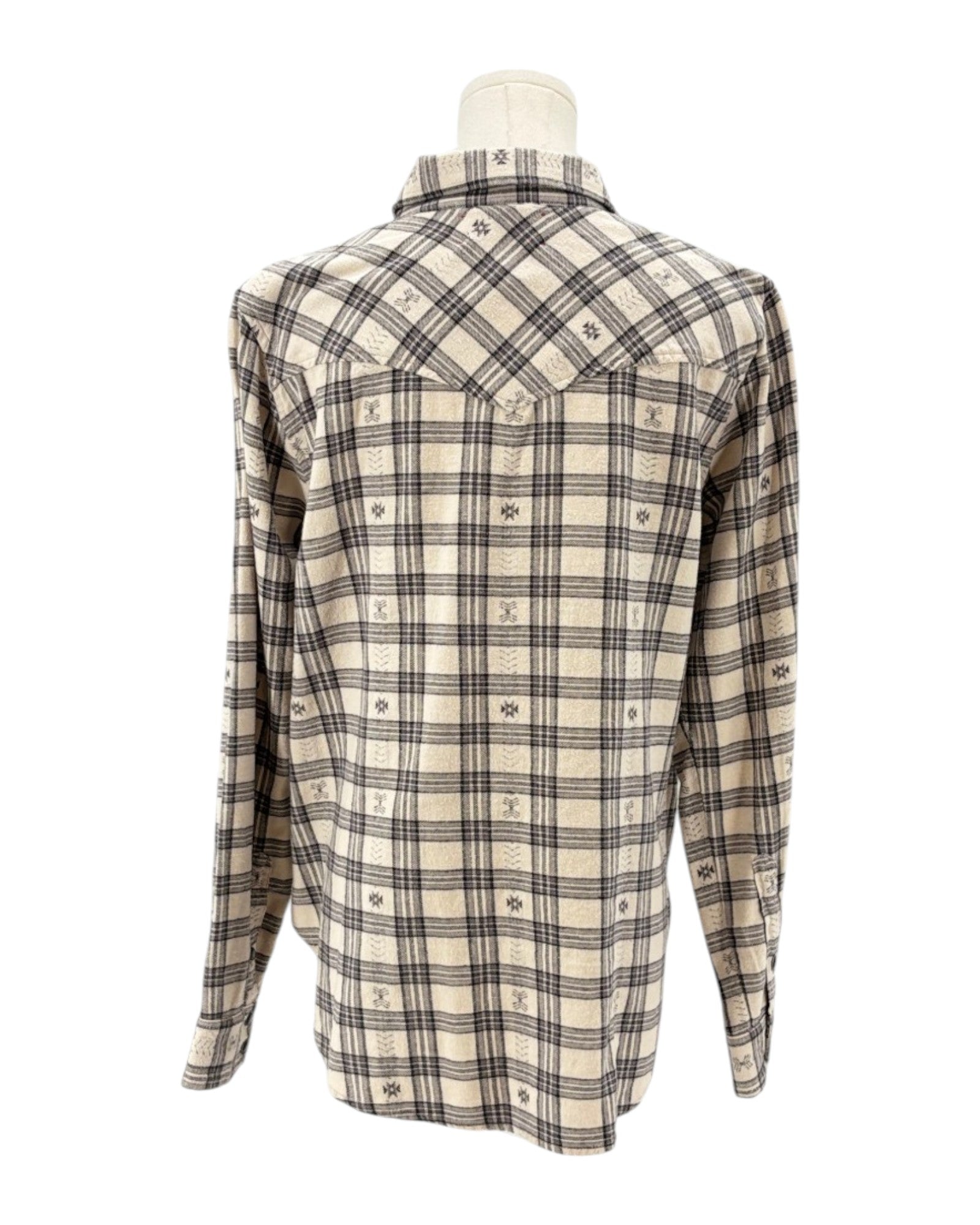 Plaid shirt on a mannequin against a white background