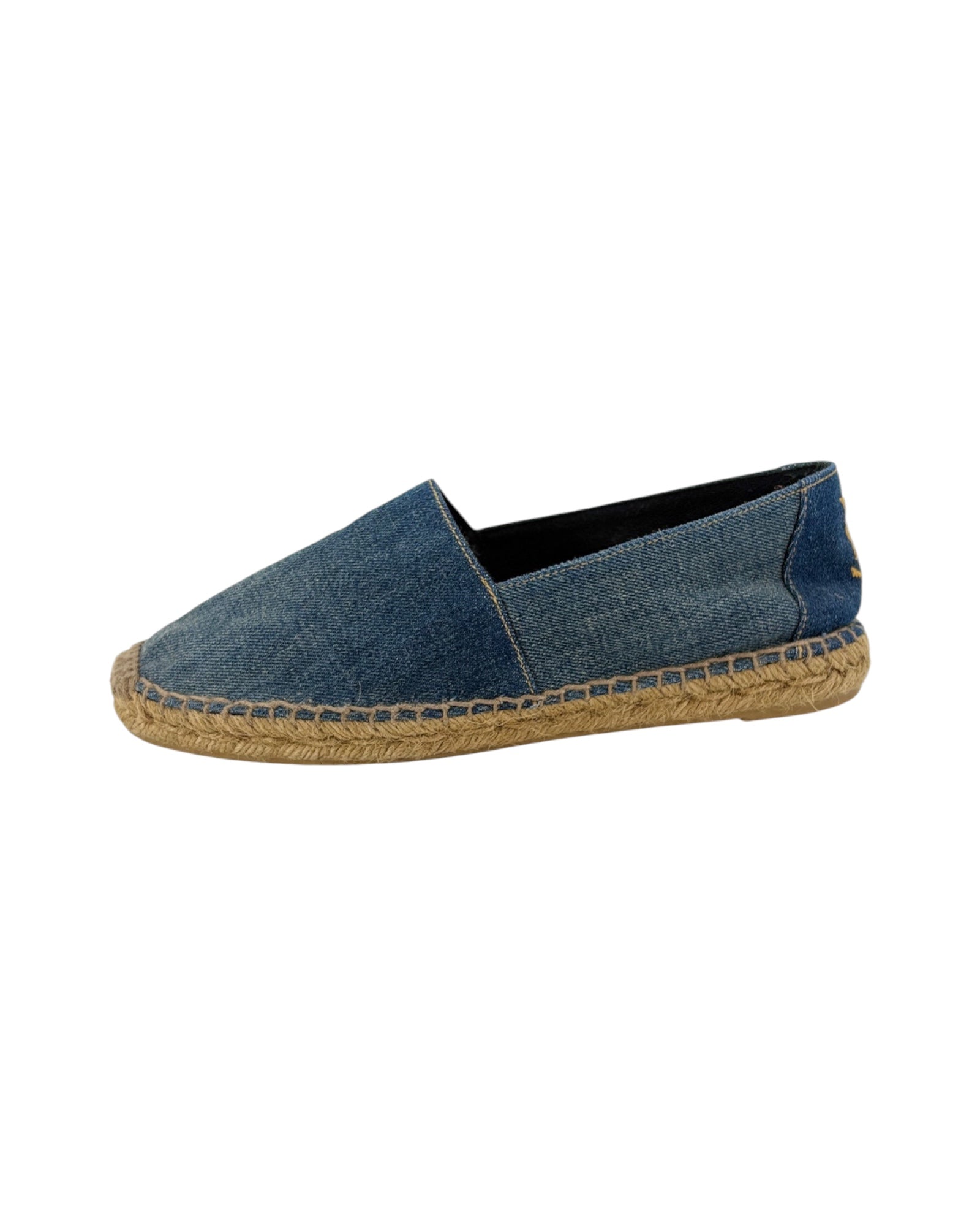 Blue espadrille shoe on a white background