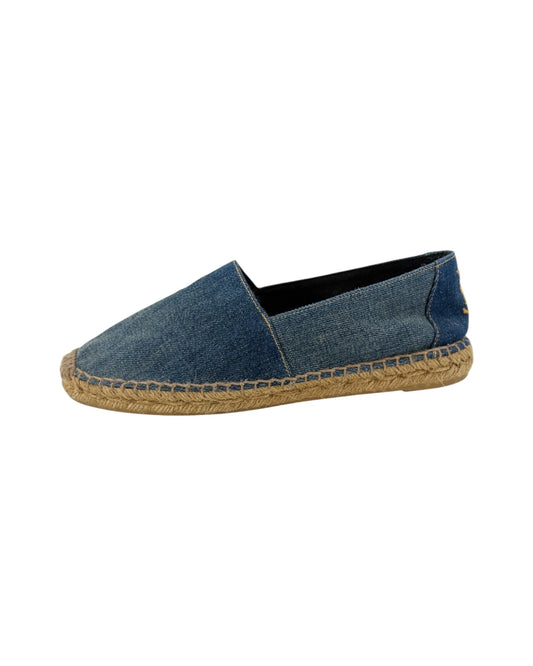 Blue espadrille shoe on a white background