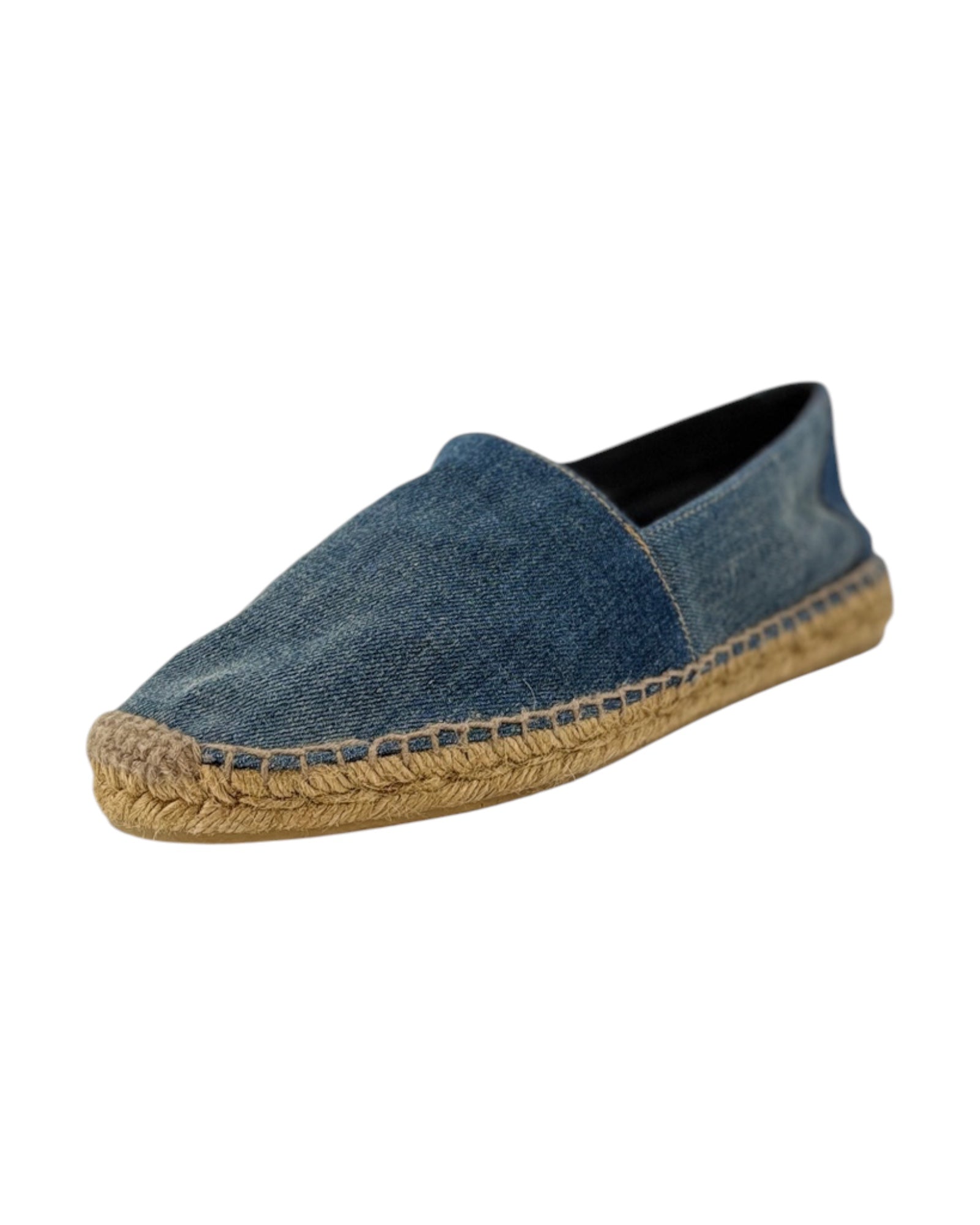 Blue denim espadrille shoe on a white background