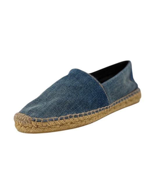 Blue denim espadrille shoe on a white background