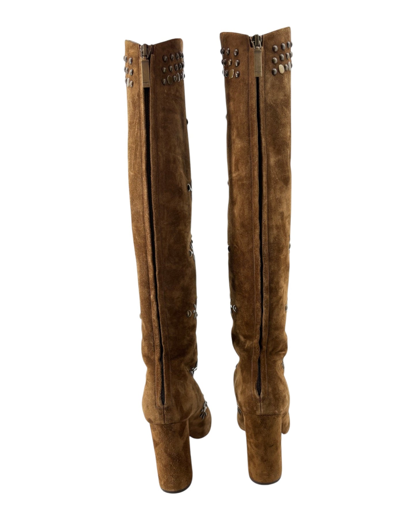 Pair of brown suede knee-high boots with decorative zippers on a white background
