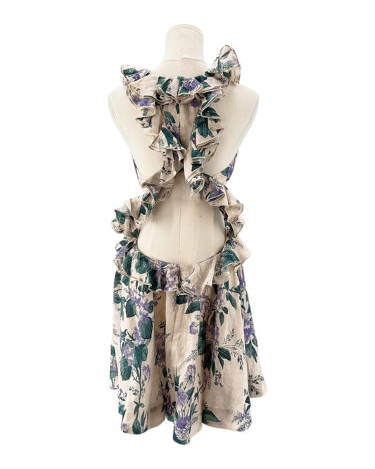 Floral dress with ruffles on a mannequin against a white background