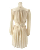 Zimmerman cream dress on a mannequin against a white background