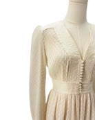Zimmerman cream dress on a mannequin against a white background