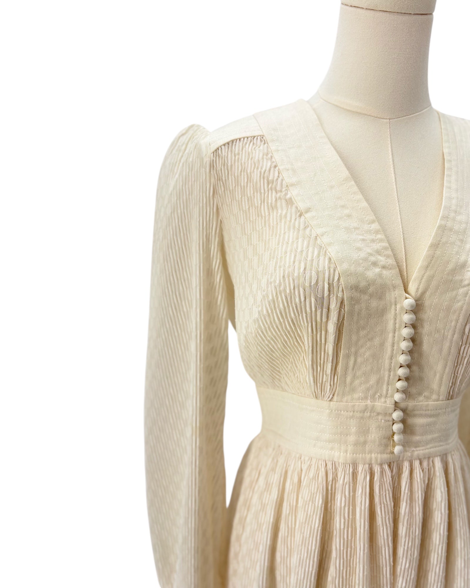 Zimmerman cream dress on a mannequin against a white background
