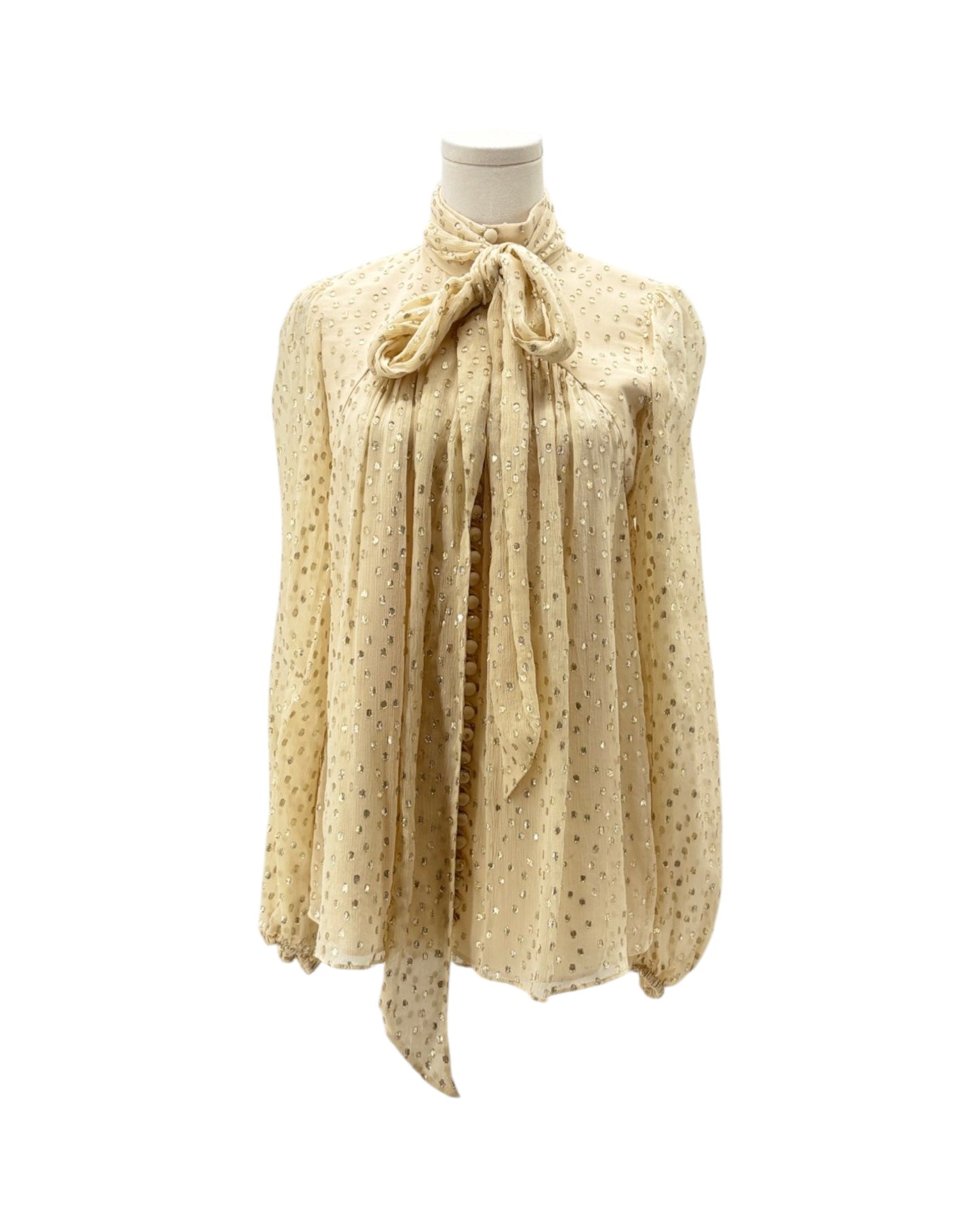 Beige blouse with a pattern on a white background
