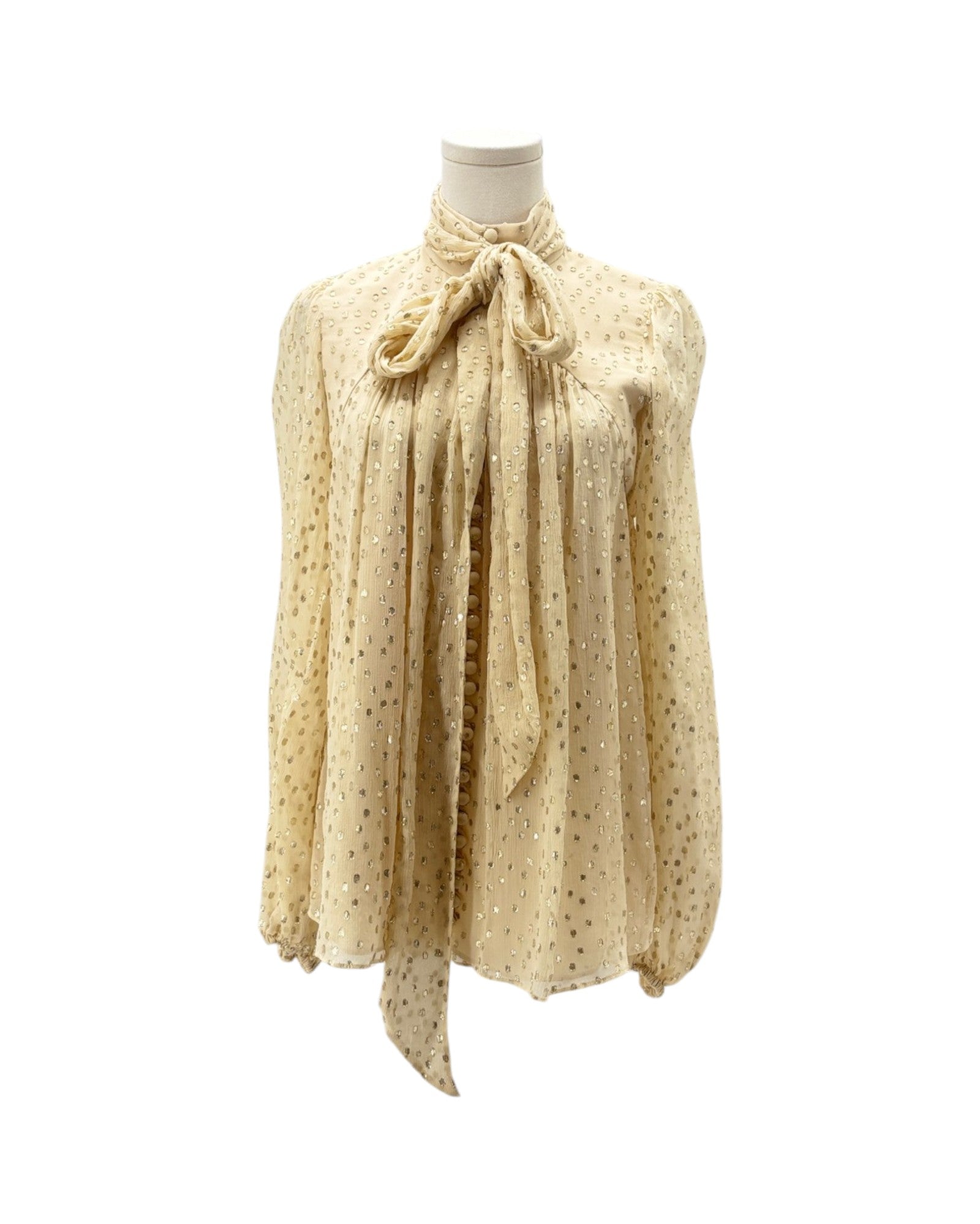 Beige blouse with a pattern on a white background