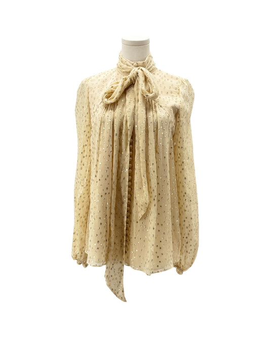 Beige blouse with a pattern on a white background