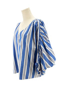 Blue and white striped top on a mannequin against a white background